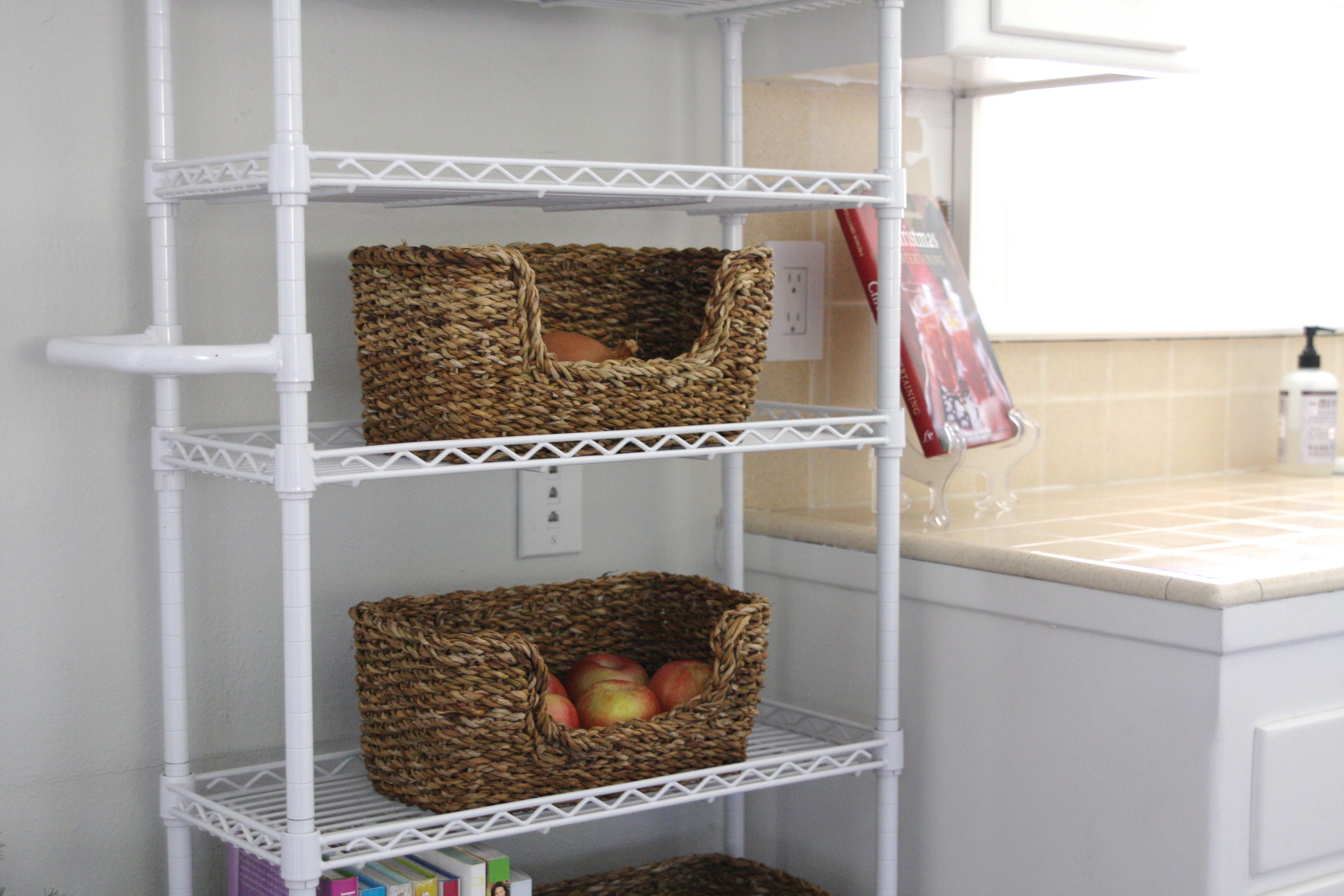 Use Baskets To Organize Your Small Kitchen - Through My Front Porch