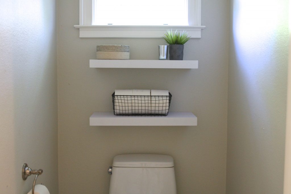 Simply Organized Floating Shelves in the Powder Room