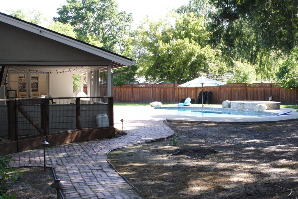 New Concrete Patio in a Backyard on Simply Organized