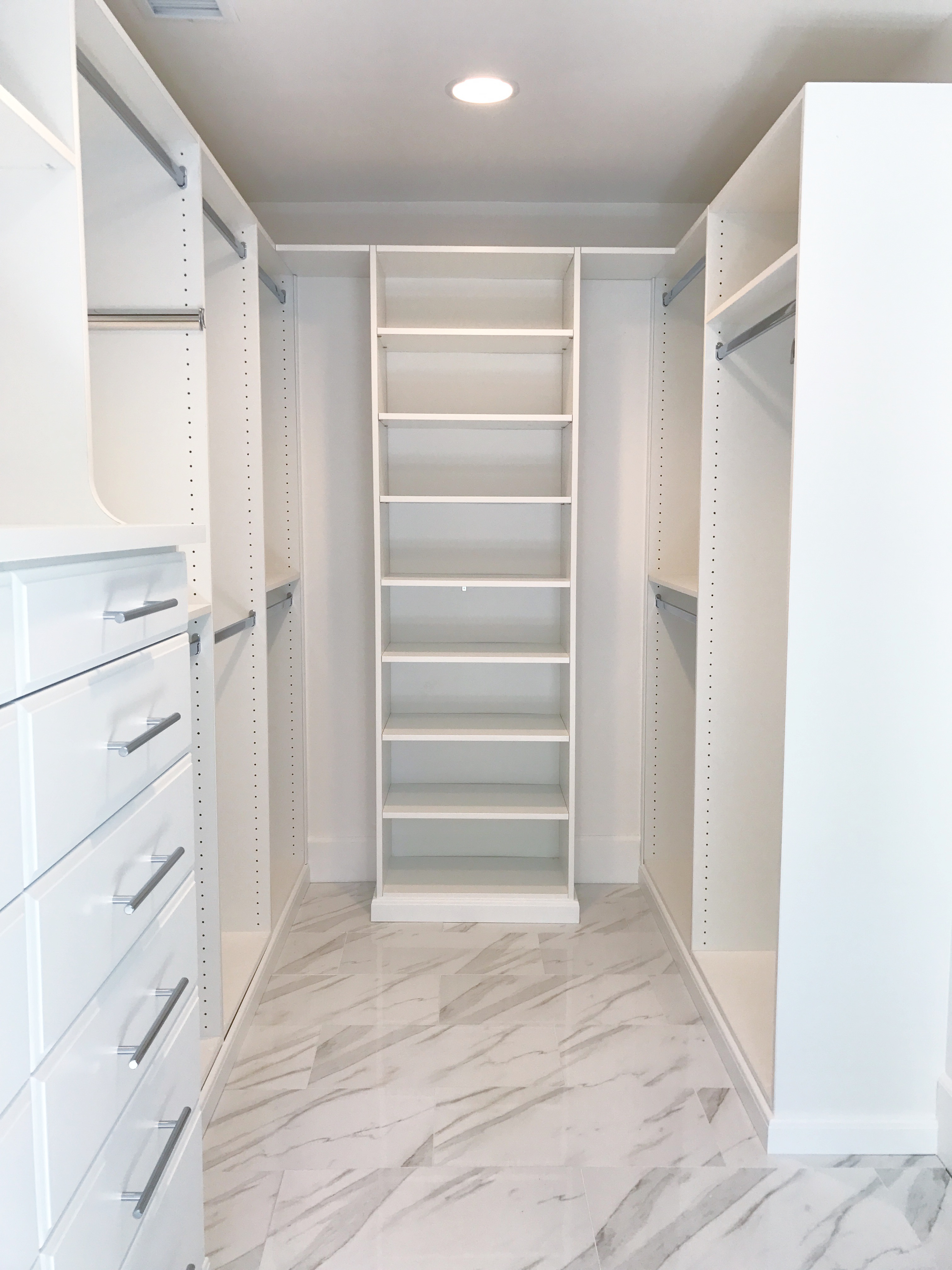 White and Marble Master Closet