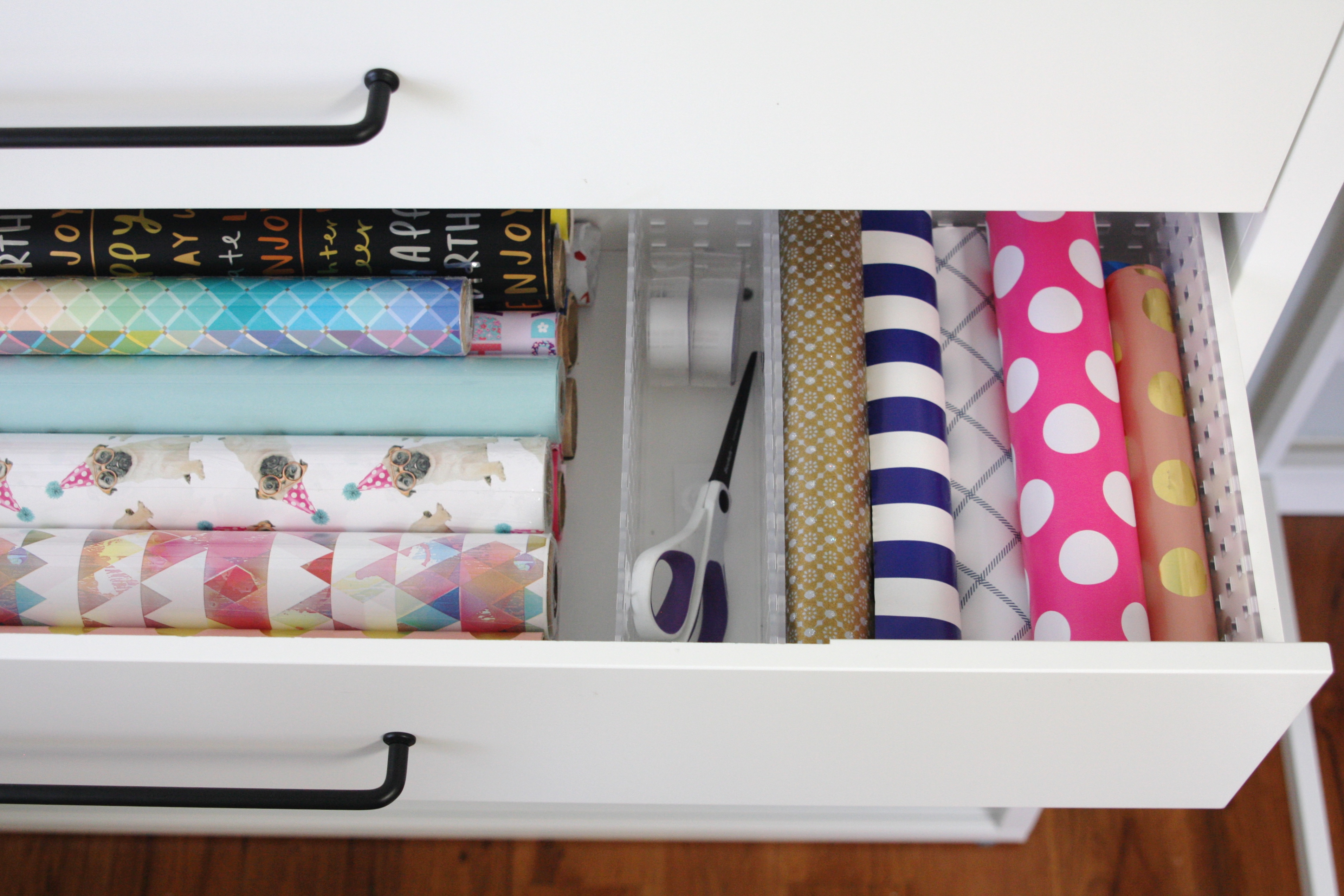 Organized Gift Wrap Shelf with the Ikea Fjalkinge Shelf