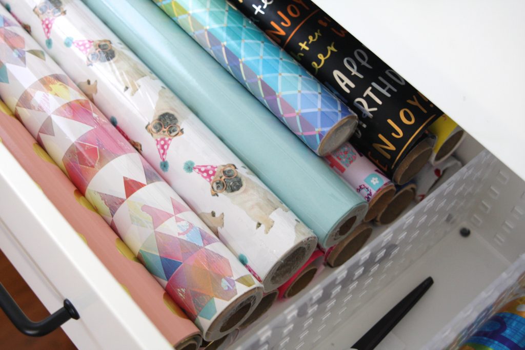 Organized Gift Wrap Shelf with the Ikea Fjalkinge Shelf
