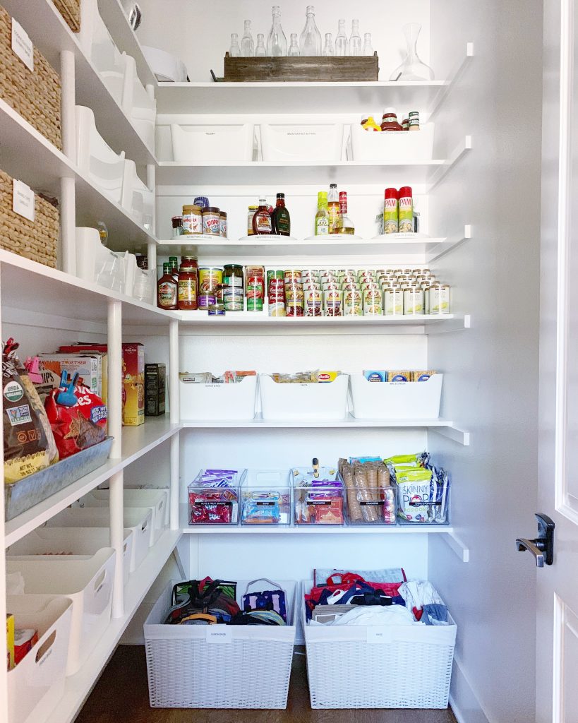 https://simplyorganized.me/wp-content/uploads/2019/09/white-pantry-wicker-bins-819x1024.jpg