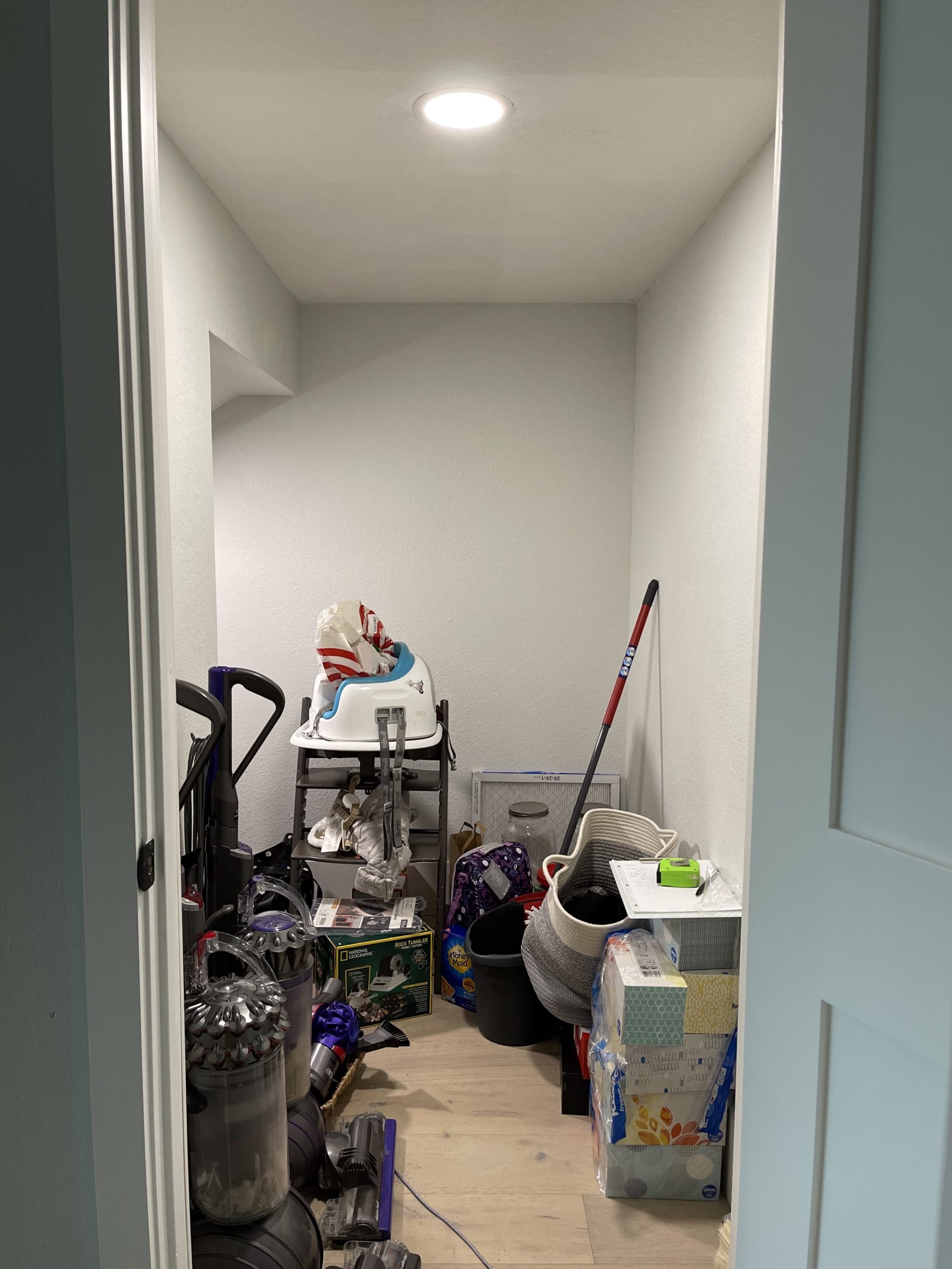 https://simplyorganized.me/wp-content/uploads/2022/08/simply-organized-under-stairs-closet-danville-california-before-with-contents-scaled.jpg